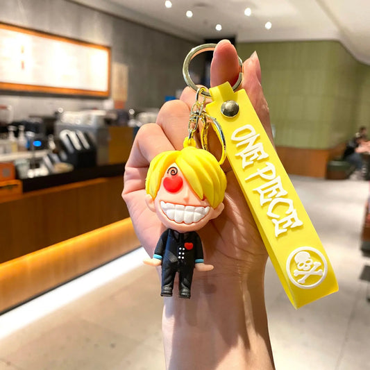 Cartoon-sleutelhanger van One Piece – Sanji met gele hanger