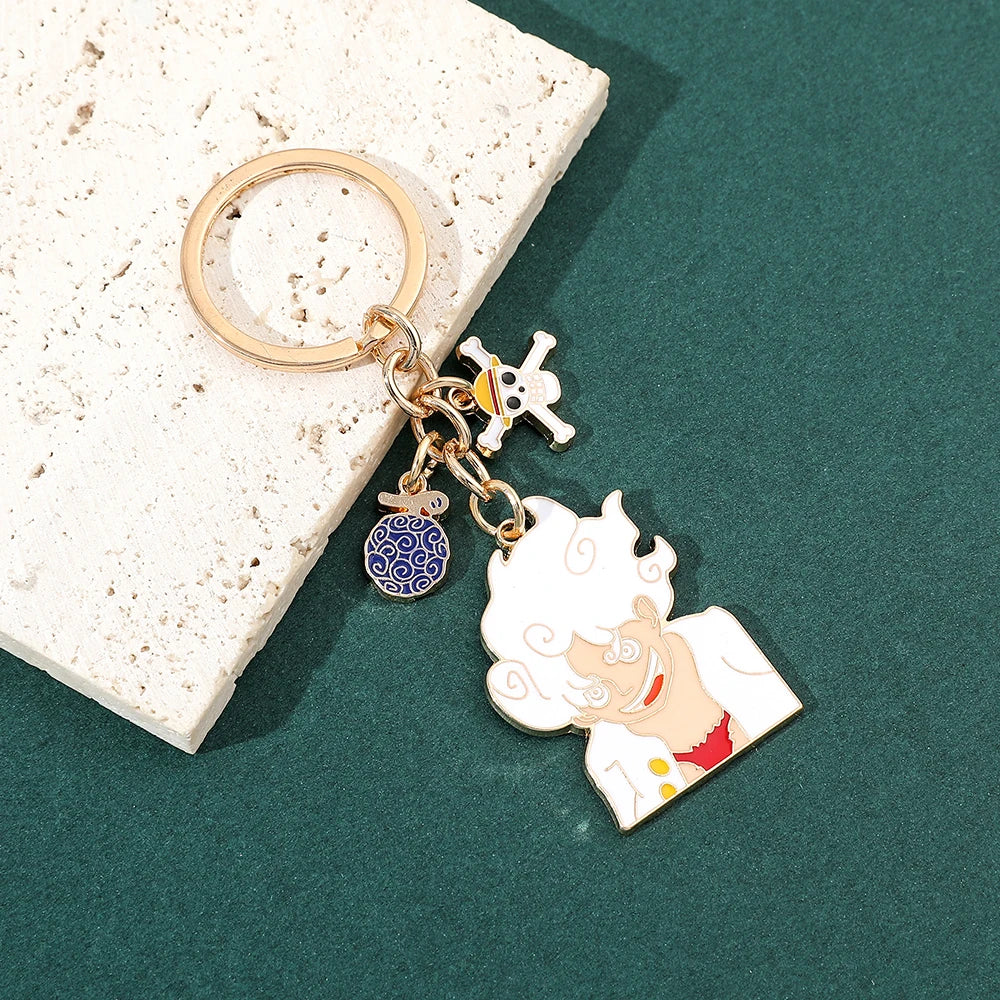 One Piece-sleutelhanger - Monkey D. Luffy Gear 5 Nika (geëmailleerd)