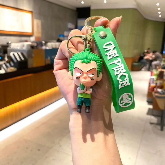 Cartoon-sleutelhanger van One Piece – Zoro met groene achtergrond