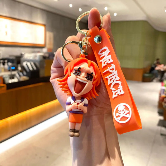 One Piece-cartoon-sleutelhanger – Nami met overdreven gezichtsuitdrukking