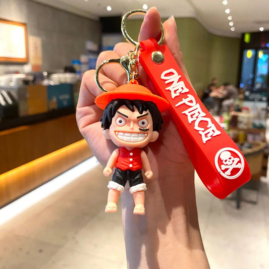 Cartoon-sleutelhanger van One Piece – Luffy met rode achtergrond